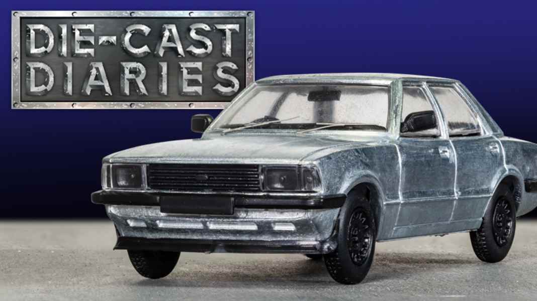 Corgi feilt in 1:43 unter Hochdruck am Ford Cortina Mk. 5 als Die-Cast-Modell
