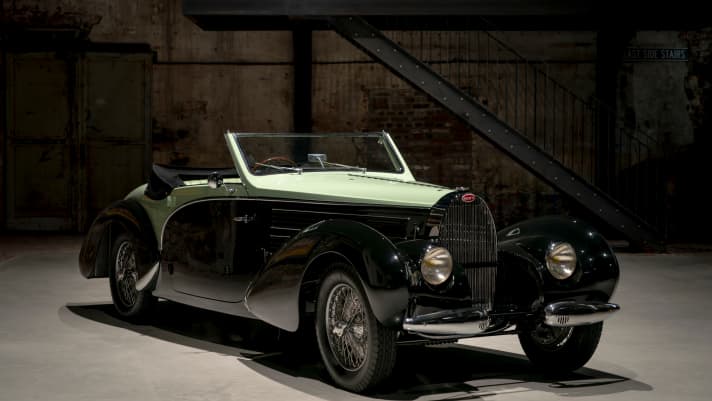 Als 1. Preis in der Leserwahl winkt ein “Bugatti-Frühstück” im Nationalen Automuseum (NAM), dass am 23. Juli seine Pforten öffnen wird. Mehr wird jetzt noch nicht verraten.