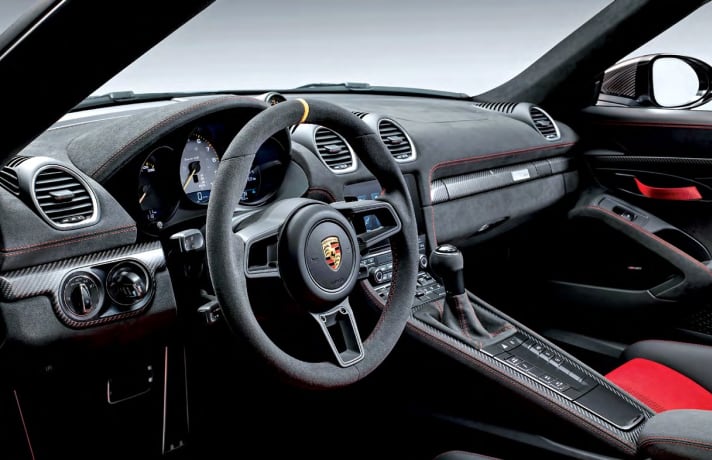 Griffiges RS-Sportlenkrad mit Race-Tex und gelber 12-Uhr-Markierung