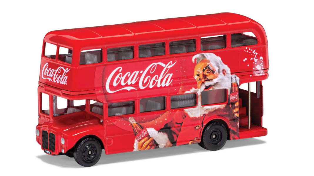 Corgis London Bus fährt den Weihnachtsmann spazieren