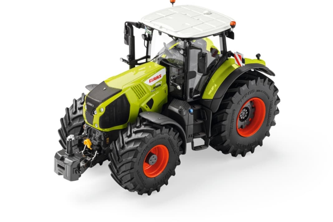 Hier ist der Claas 850 ST. V als Die-Cast-Modell mit der einfachen Standard-Bereifung zu sehen