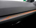 Der Hinweis auf den Quattro-Antrieb ist stilvoll vor dem Beifahrersitz in den Armaturenträger eingearbeitet