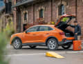 Die extravagante Form des Q3 Sportback schränkt den Alltagsnutzen nicht ein, die verschiebbare Rückbank sorgt für zusätzliche Variabilität
