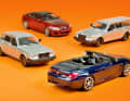 Beim BMW M6 sind die Fotomuster von Minichamps bereits durchdekoriert, die 240er von Volvo tragen noch den silbernen Prototypen-Look