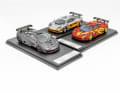 McLaren F1 GTR Studie „Karbon“, rotes Pressepräsentationsauto und silbernes Testcar Le Mans als 1:43-Verkleinerungen