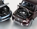 Mercedes G63 und Porsche Cayenne Turbo S von Minichamps in 1:18