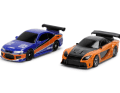 Dem Set liegen auch zwei Autos bei. Links oben ist der Nissan Silvia S15 "Mona Lisa" zu sehen, rechts der Nissan 350 Z mit Karbon-Umbau vom "Drift King" ] Foto: Jada Toys