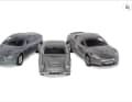 Einen kompletten DBS (rechts) gibt es im Corgi-Set zusammen mit dem DB5 (Mitte) und dem V12 Vanquish im angenäherten Maßstab 1:43