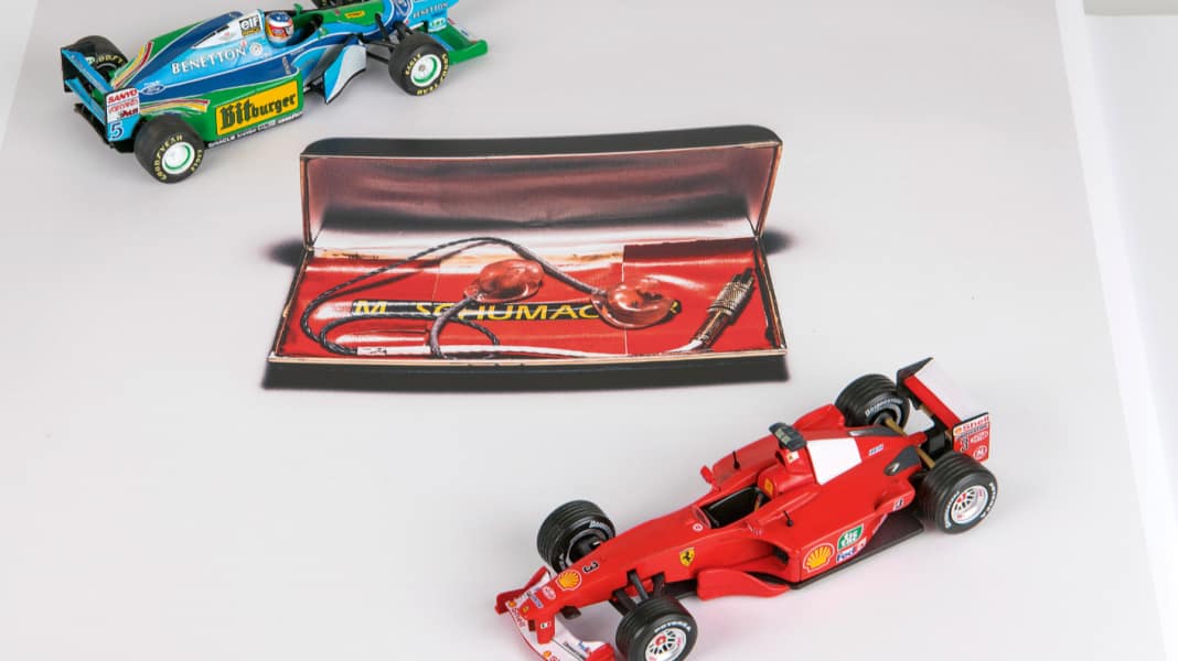 Zwei Schumi-Flitzer in 1:43 und ein Buch – Wagen-Rennen