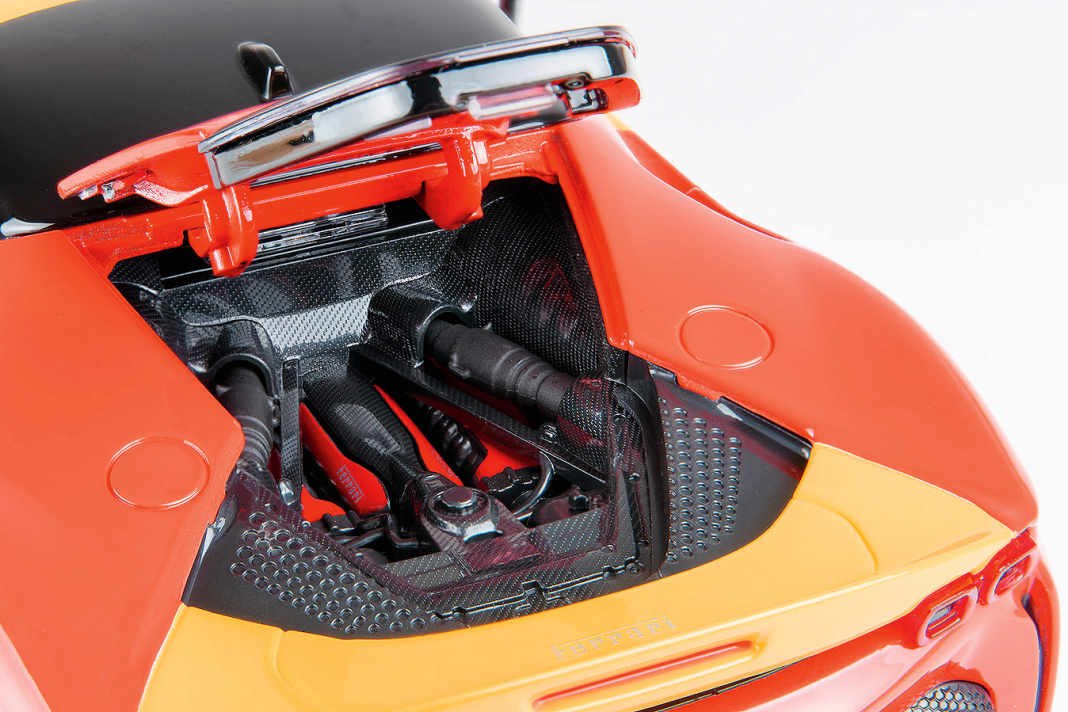 Der ausgefeilte 1:18-Motor des SF90 und das sportliche Interieur sind weitere Pluspunkte des 1:18-Modells aus Die Cast von Bburago