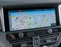 Das 10,9-Zoll-Infotainmentsystem (Serie) kommt mit Navigation und Online-Funktionen. Lobenswert: die beiden haptischen Drehregler, welche die Touchbedienung wirkungsvoll unterstützen