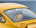Der gelbe 911 (964) RS 3.8 von Solido aus Die Cast tritt gegen den roten RS 3.6 Clubsport von GT Spirit im Maßstab 1:18 aus Resine an
