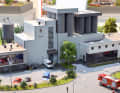 Ebenfalls zum Veltins-Geburtstag entstand dieses Faller-Modell der modernen Brauerei in 1:87 mit einem Wiking VW LT 28 als Sondermodell ] Foto: Werk