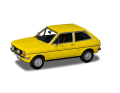 Bereits länger im Programm der Vanguards in 1:43 ist der erste Ford Fiesta. Hier als edler Ghia 1.1 in Signal Yellow, aufgehübscht mit Leichtmetallfelgen. ] Foto: Werk