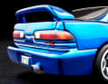 Der neue Honda R in 1:64 trägt nicht nur einen originalgetreuen Heckflügel, er ist auch sehr aufwendig dekoriert. ] Foto: Werk