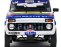 So fährt ein Lada 1984 zur Paris-Dakar: ohne Stoßstangen, mit schmalen Reifen und nur einem Außenspiegel ] Foto: Werk