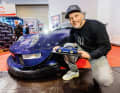 Die Katze ist aus dem Sack: Auch Tuning-Experte und TV-Moderator Sidney Hoffmann ist ein ganz verrückter Modellautofan. Stolz zeigt er den 1:18er des RWB Furusato.