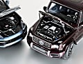 Mercedes G63 und Porsche Cayenne Turbo S von Minichamps in 1:18