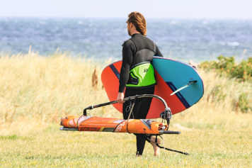 Easy to the water - carrying surf equipment, made easy