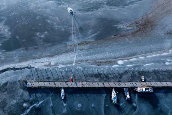 Photo tour through harbours, lakes and along the coasts