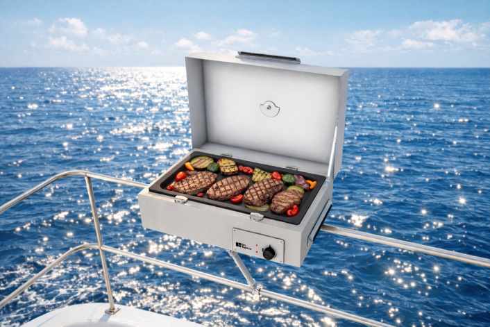 Electric barbecue with splash guard for the deck