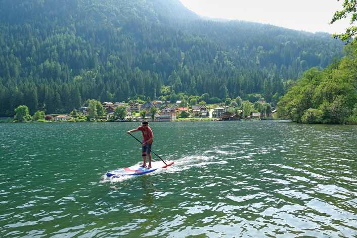 With SUP and bike on Lake Millstatt