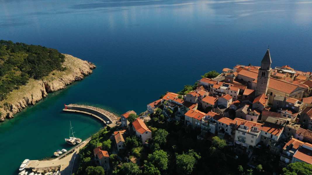 Around Krk, with its bays, the bora and karst landscapes