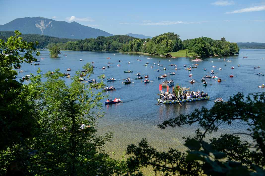 By boat to the procession