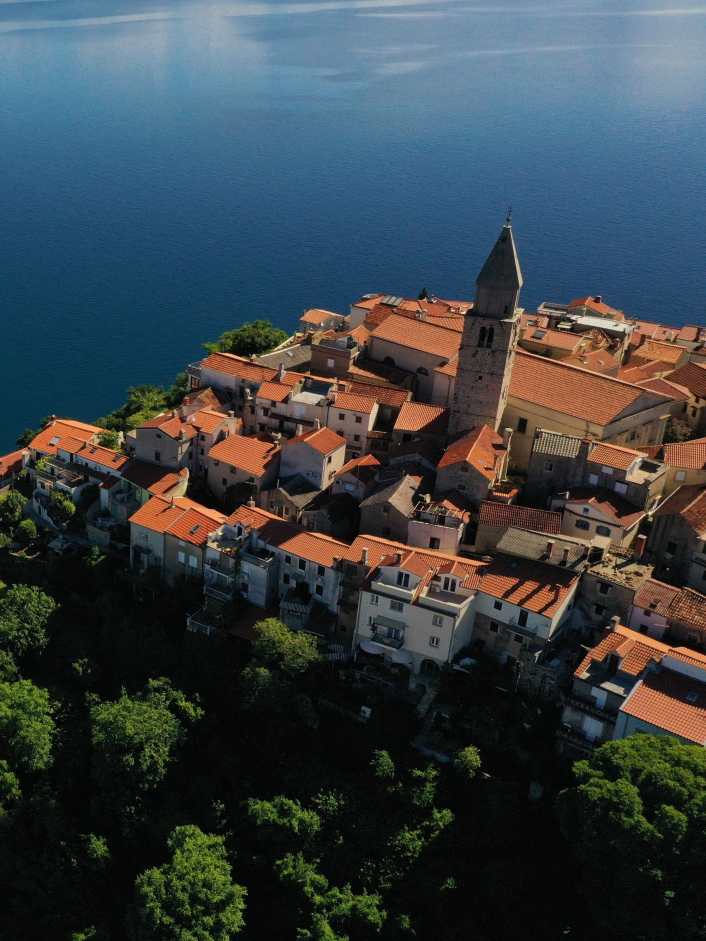 Around Krk, with its bays, the bora and karst landscapes