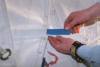 Cleaning, checking and repairing sailcloth