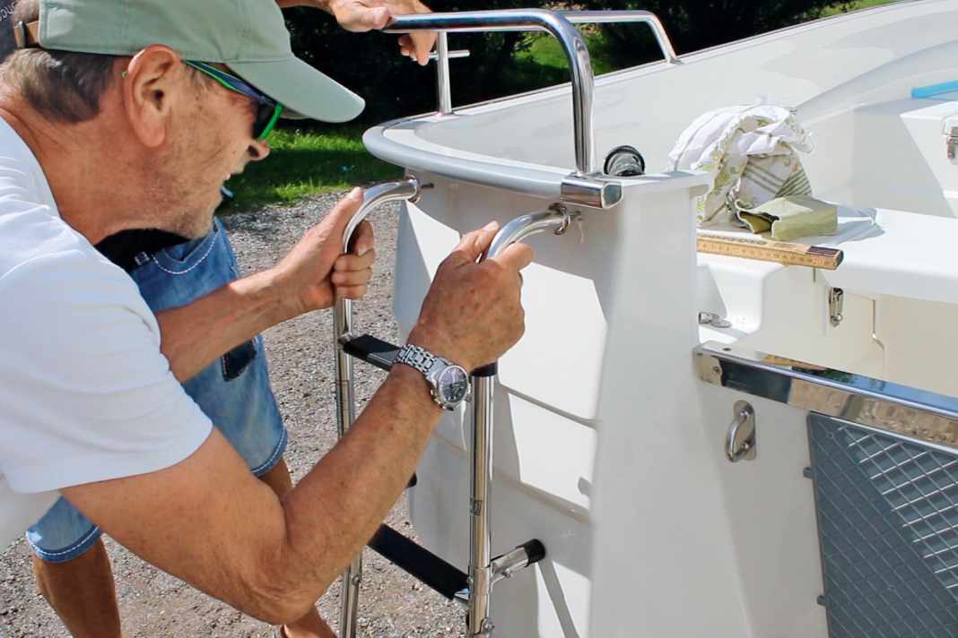 Installing the swim ladder, anchor roller and stowage boxes