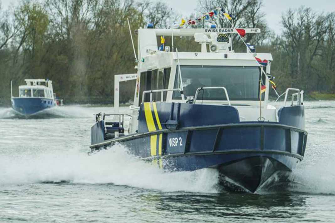 Ships break through police cordon on the Rhine
