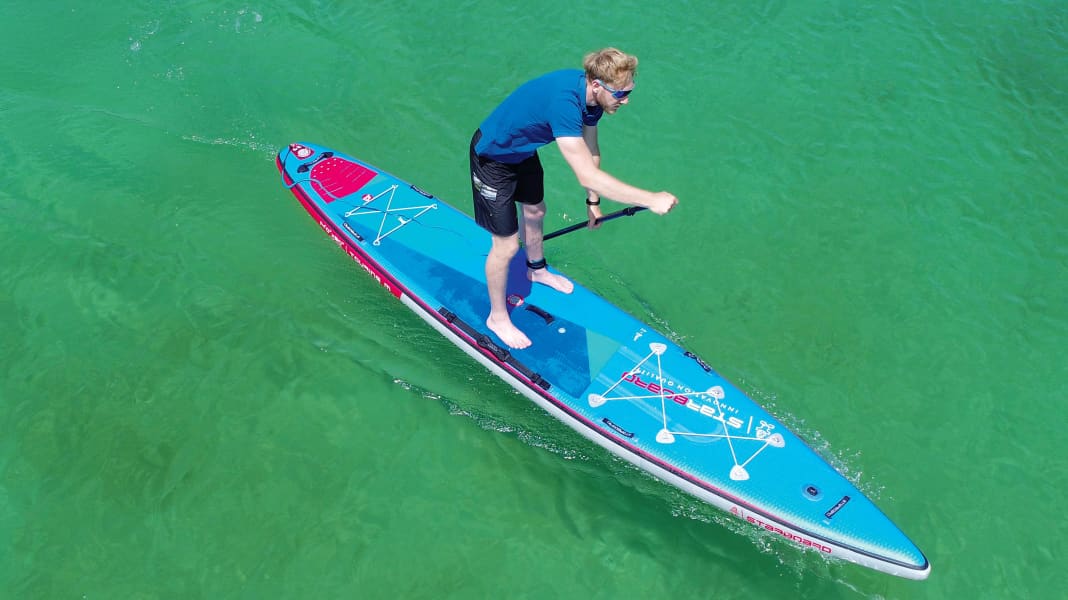 SUP riding technique: distance stroke and fast turns