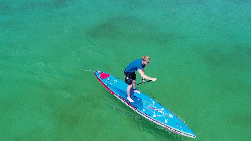 SUP riding technique: distance stroke and fast turns