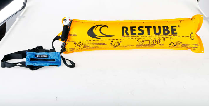 Restube Classic | www.restube.eu | 74,95 Euro. Very small bag. Inflates immediately by pulling in an emergency. Buoyancy aid to hold on to or follow on a line when swimming. to swim with it. No protection in case of unconsciousness or extreme weakness.