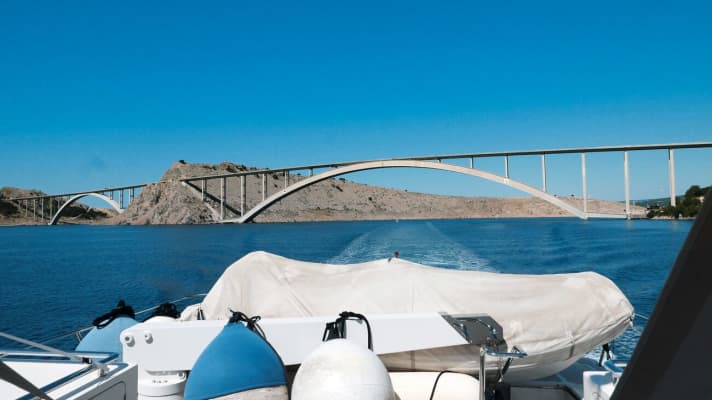  The two concrete arches of Krčki most connect the mainland with the island of Krk