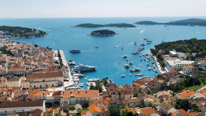 View of the harbour of the town of Hvar with the Pakleni Islands off the coast