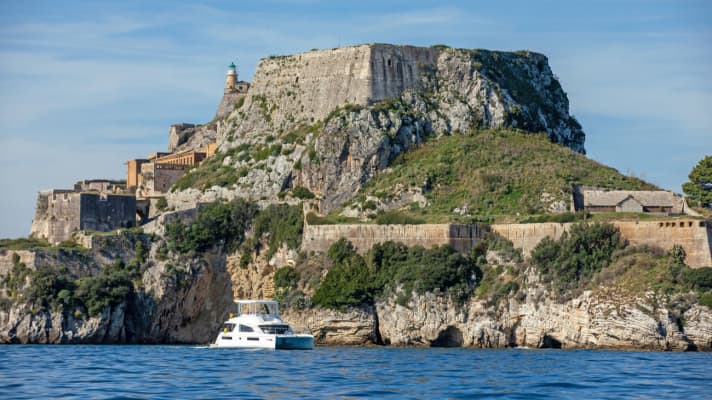 Our catamaran and the imposing old fortress
