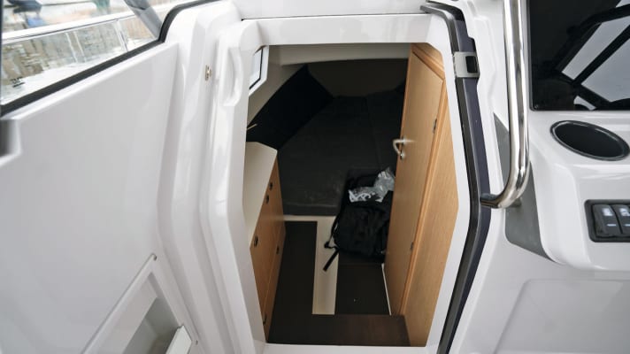 The companionway is closed by a sliding door, which was not yet locked on the test boat