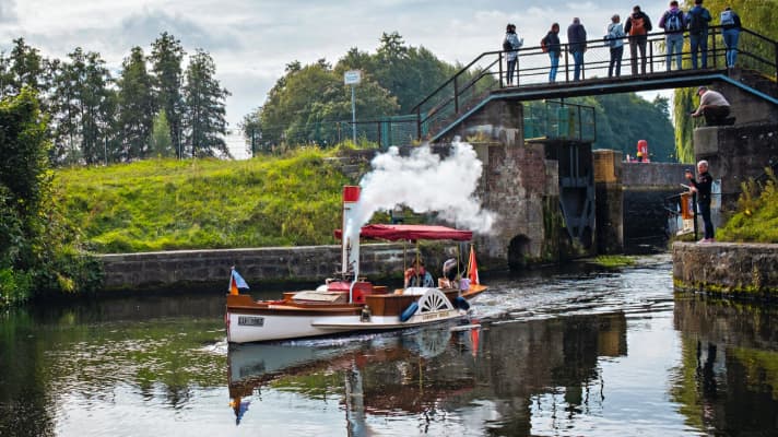 Clear sailing for the "Liberty Belle". Side paddle wheels are a particular rarity on boats of this size