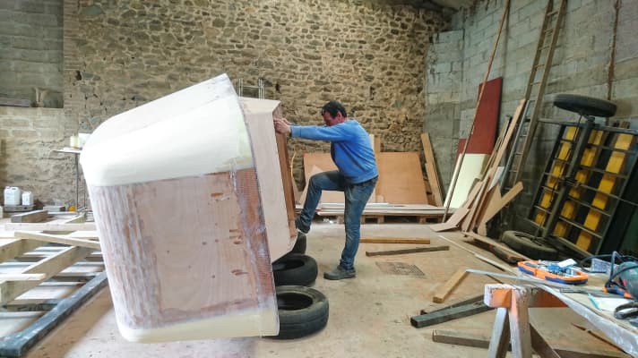   The small deep-sea boat during the construction phase in Quenet's shipyard