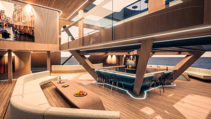 Atrium: The beach club extends over two levels. An infinity pool extends above the bar.