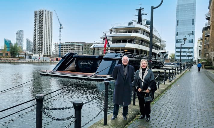 With his partner Vanessa in front of "Here Comes The Sun" in London