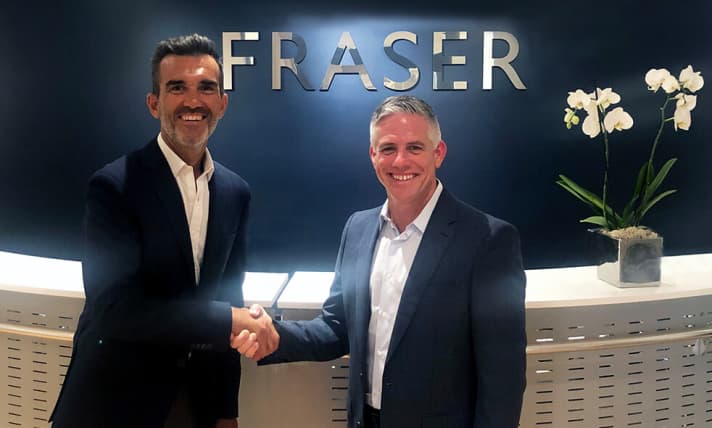 In agreement: Fraser CEO Raphael Sauleau (left) and W. Brett McGill, CEO of MarineMax | ax