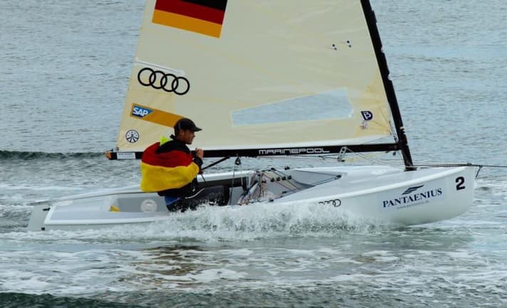   Like a golden rider: Phillip Kasüske on his way into the harbour after the 13th and final race