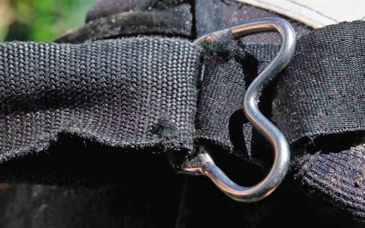 Chafed webbing on the harness - better not to buy! As a rule, it cannot be easily replaced.