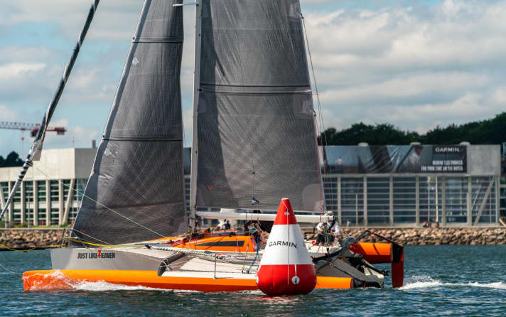 In the background the International Aarhus Sailing Centre, in front a snapshot from the Garmin Round Denmark Race