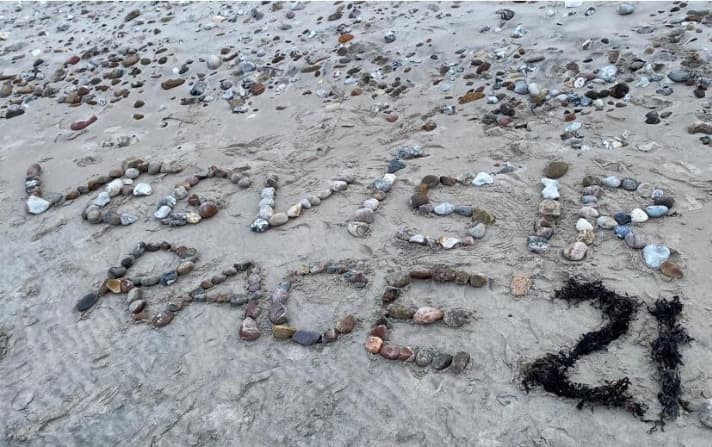   Image créative de la plage pour la Vegvisir Race 2021