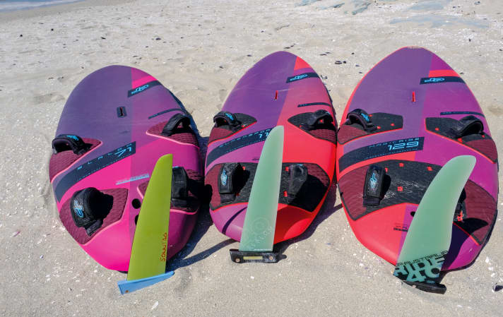 Freeride boards (right) have a rounder outline and more length than performance-orientated models