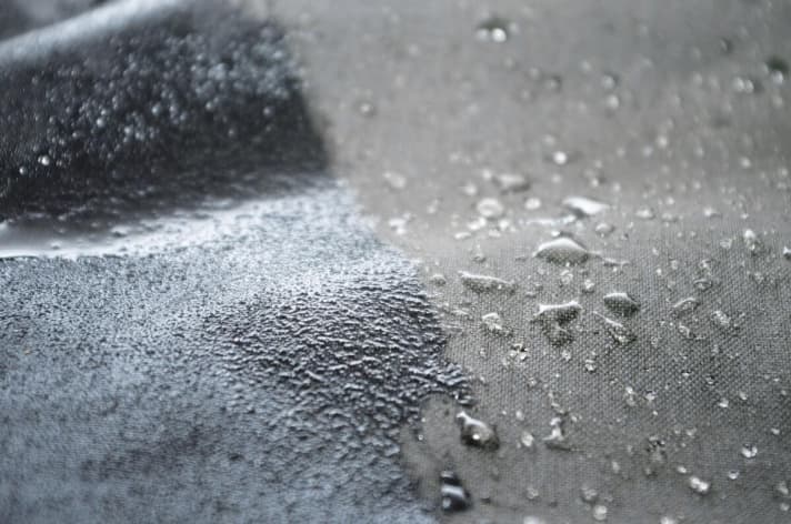   Water vapour can only be transported to the outside if the waterproofing is intact and the water beads up. Soaked fabric stops breathability